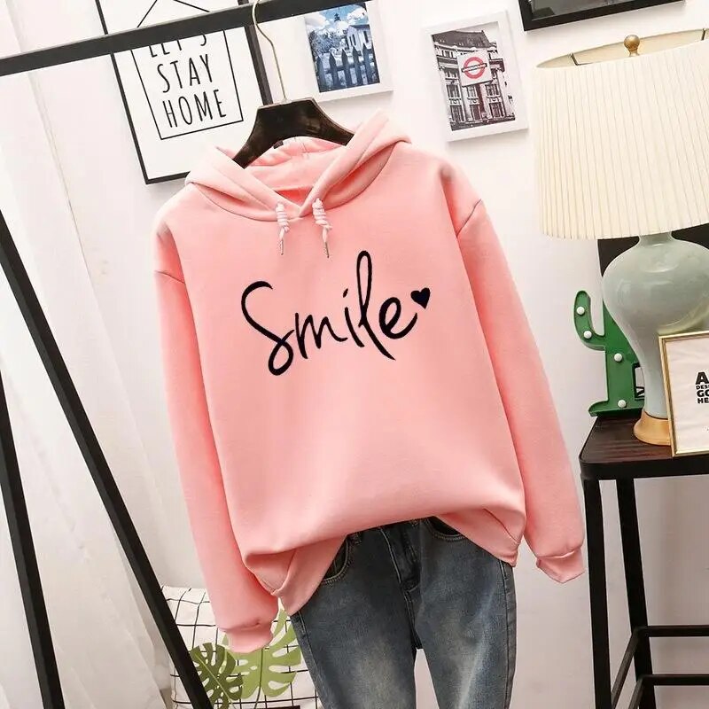 Bellamy graphic print drawstring hooded sweatshirt in pink, front view on hanger