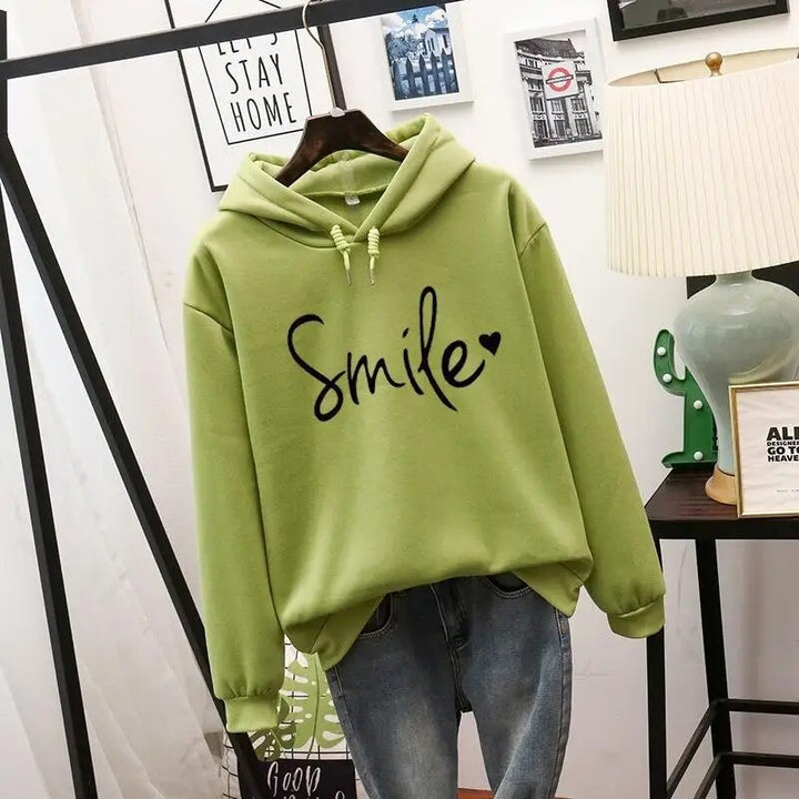 Bellamy graphic print drawstring hooded sweatshirt in yellow, front view on hanger