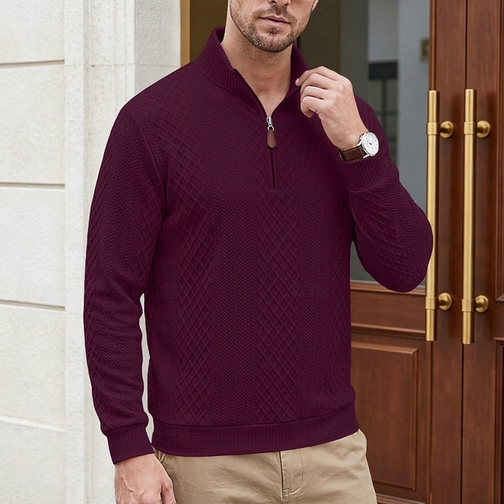 Man wearing Bennett burgundy textured quarter-zip pullover, close-up front view