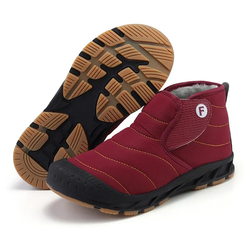 Callum snow boots in burgundy red shown with textured rubber outsole