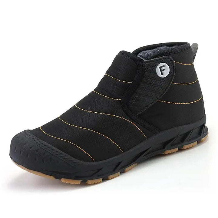Callum fleece lined slip-on snow boots in black, side angle view