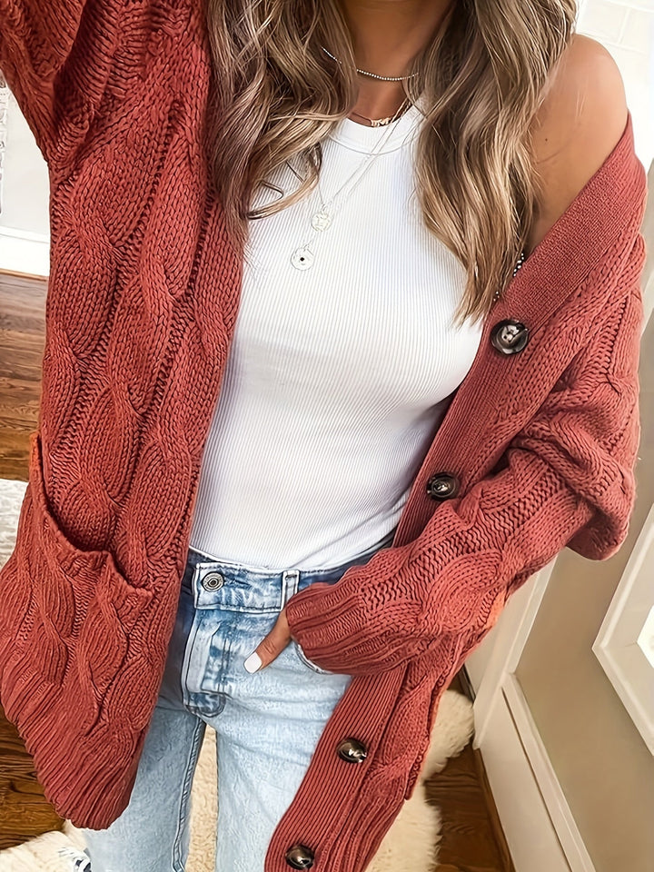 Camille cable knit button front cardigan in gray, side view with pocket detail