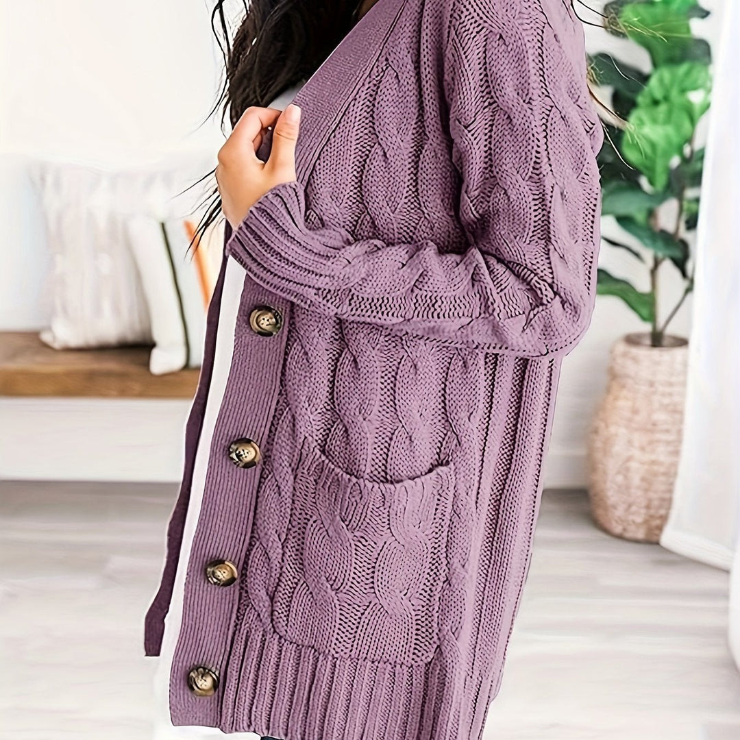 Camille cable knit button front cardigan in purple, side view with pocket detail