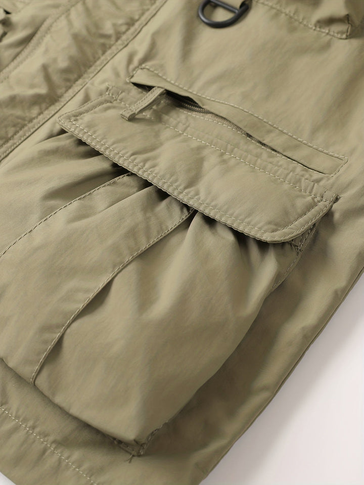 Close-up of Emerson cargo jacket lower flap pocket and pleated storage detail
