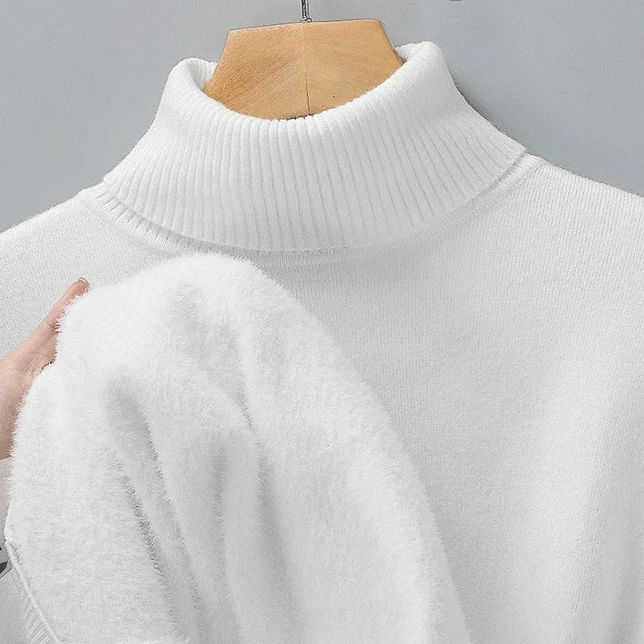 Emiliano white turtleneck sweater displayed on mannequin