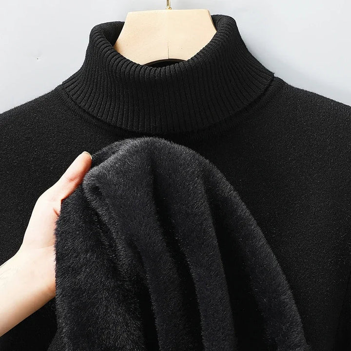 Emiliano black turtleneck sweater displayed on mannequin