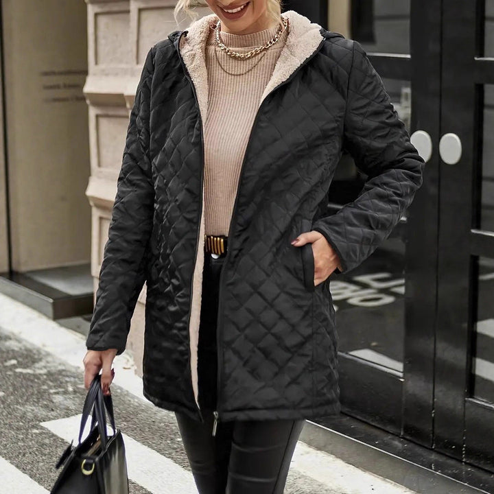 Fenella quilted hooded puffer jacket, hands in pockets front view