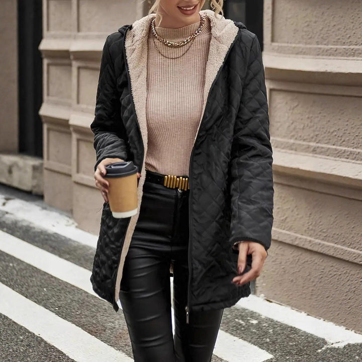 Fenella quilted hooded puffer jacket, holding coffee cup front view