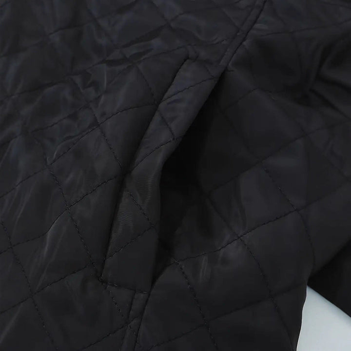 Fenella quilted hooded puffer jacket, holding coffee cup front view