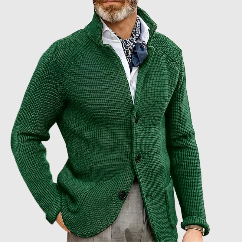 Man wearing dark green stand collar button front knit cardigan, close-up