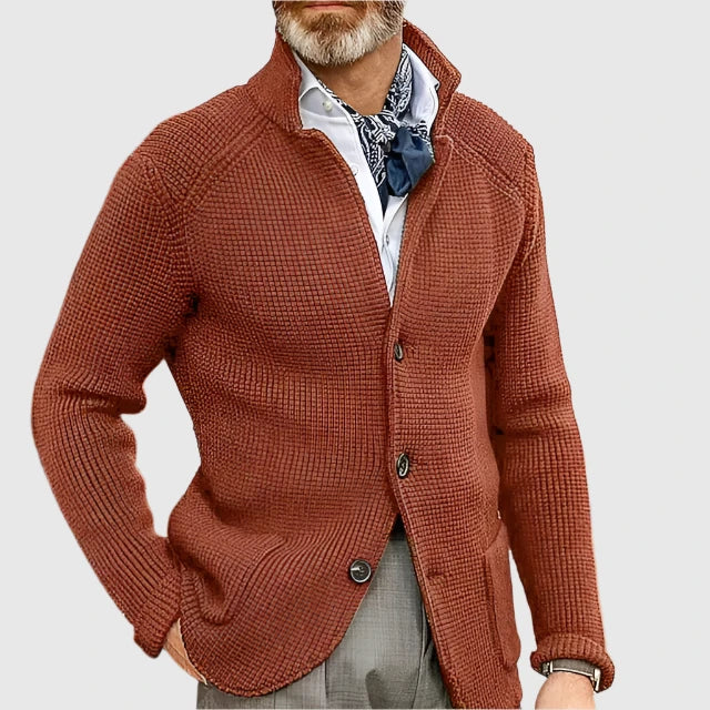Man wearing rust orange stand collar button front knit cardigan, close-up
