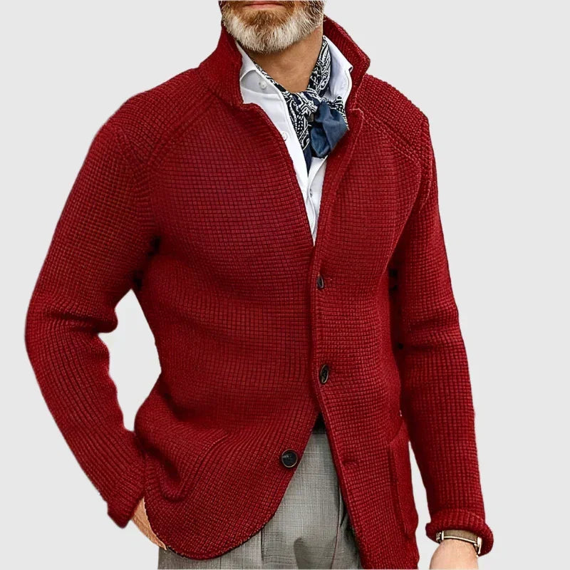 Man wearing burgundy stand collar button front knit cardigan, close-up
