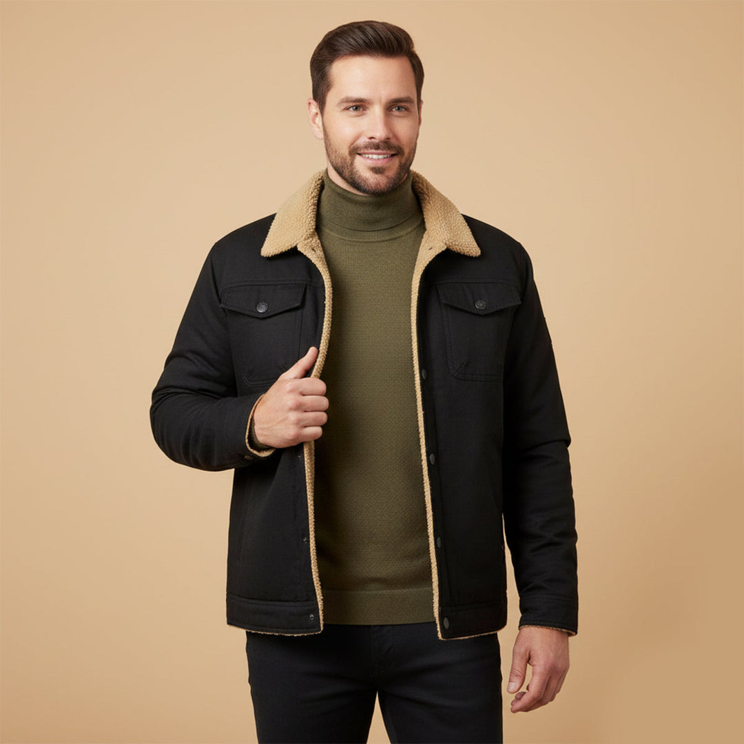 Man wearing Grayson black trucker jacket with sherpa collar, front view