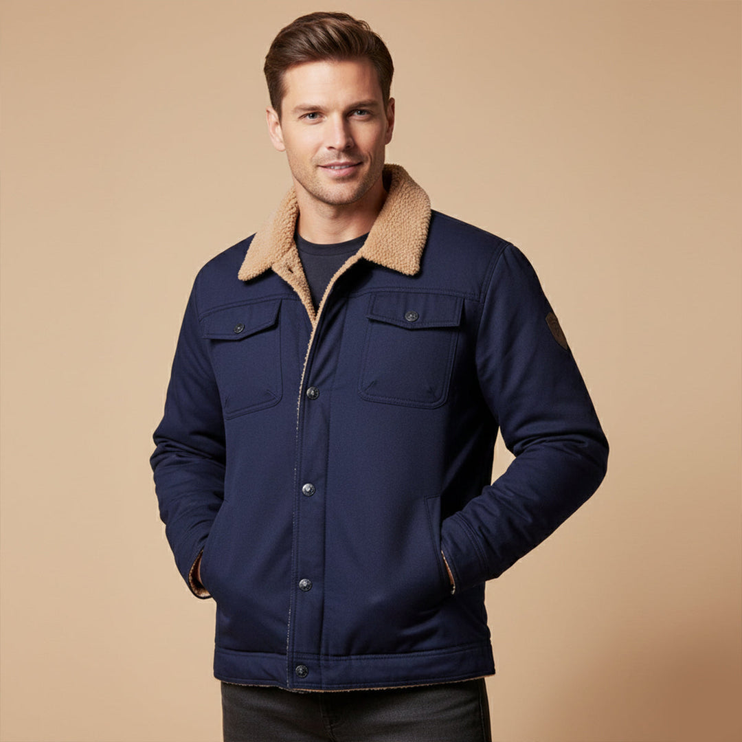 Man wearing Grayson navy blue trucker jacket with sherpa collar, front view