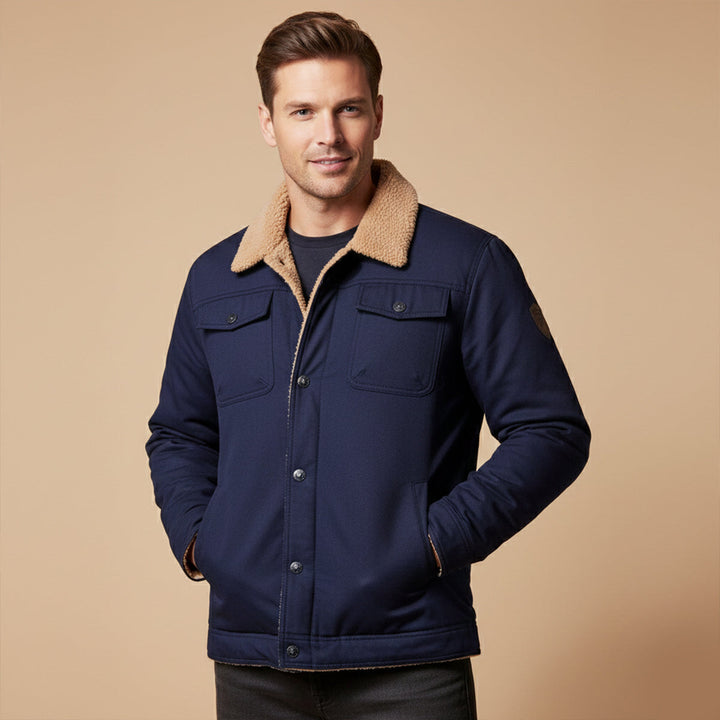 Man wearing Grayson navy blue trucker jacket with sherpa collar, front view