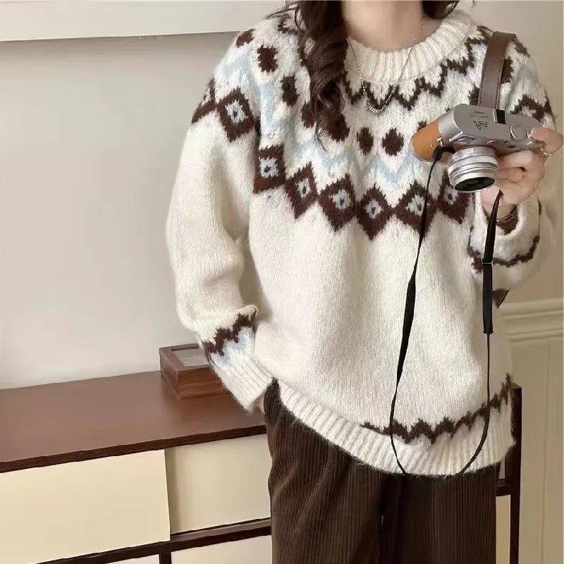 Isadora Fair Isle crew neck sweater in cream and brown, front view with model holding a camera