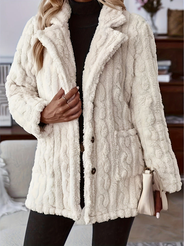 Josephine teddy coat styled with pockets and shoulder bag