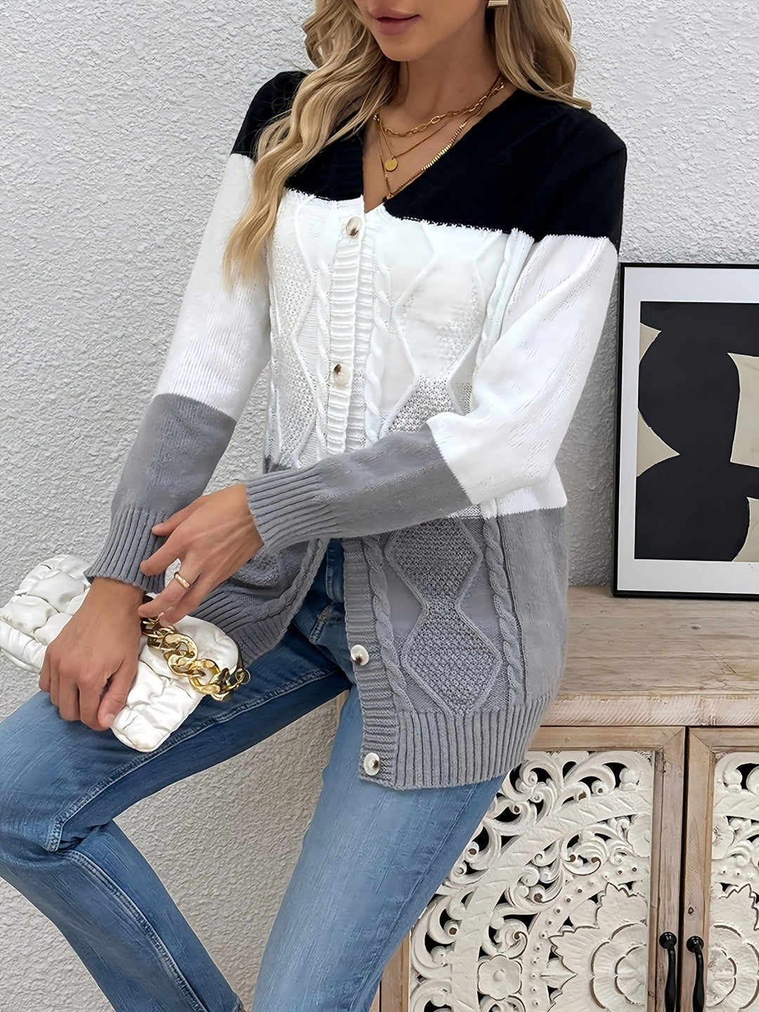 Josephine colorblock cable knit cardigan in pink and black, front view