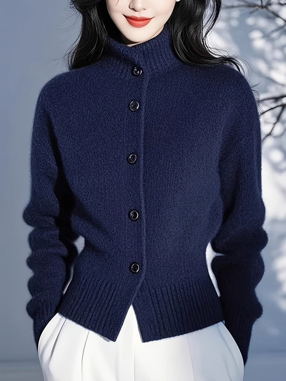 Josephine red knit cardigan, back view showing ribbed collar