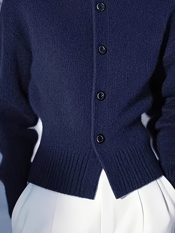 Josephine red knit cardigan, back view showing ribbed collar