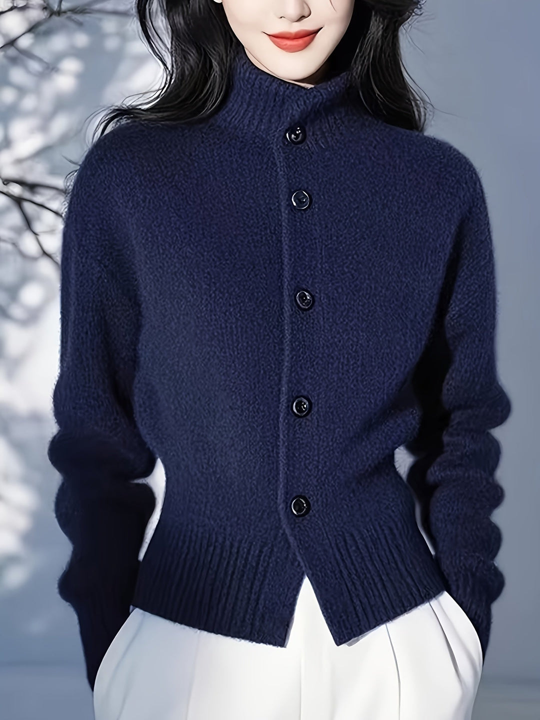 Josephine red knit cardigan, back view showing ribbed collar
