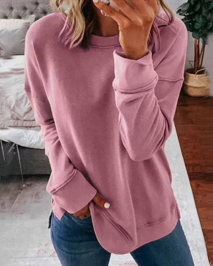 Josephine pink crew neck sweater with thumbhole cuffs, front view