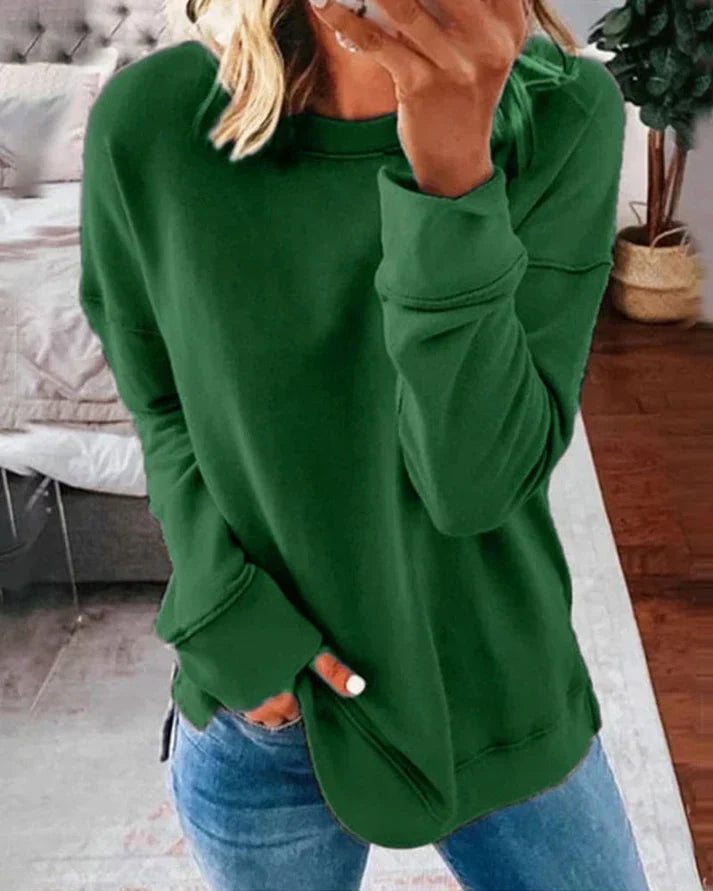 Josephine green crew neck sweater with thumbhole cuffs, front view