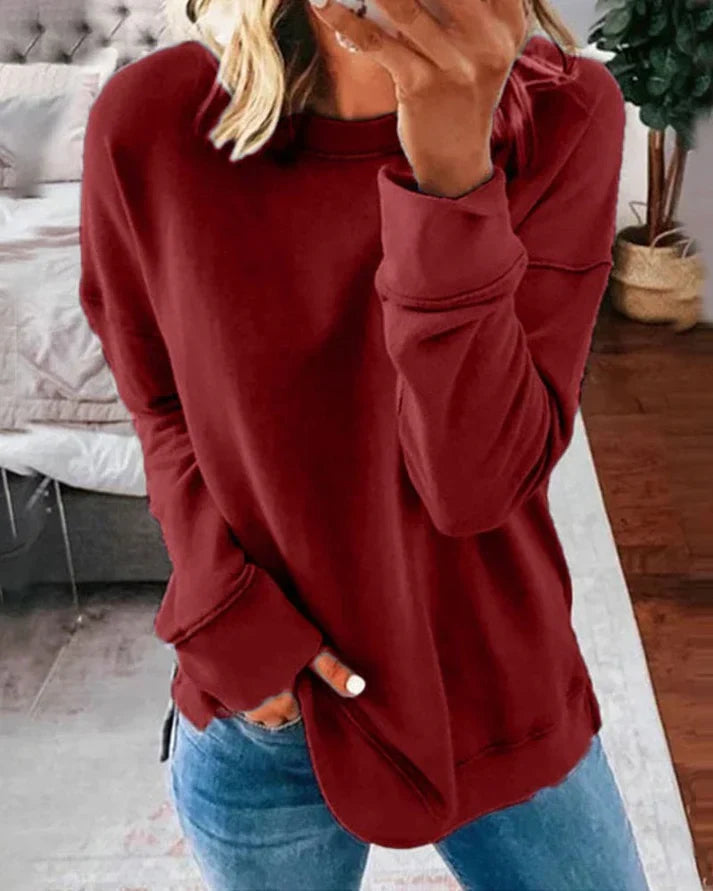 Josephine red crew neck sweater with thumbhole cuffs, front view