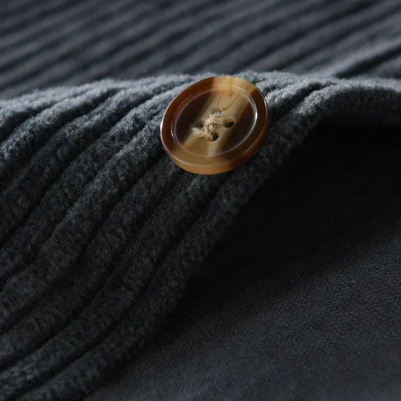 Close-up of horn-style button on Julian corduroy shirt cuff
