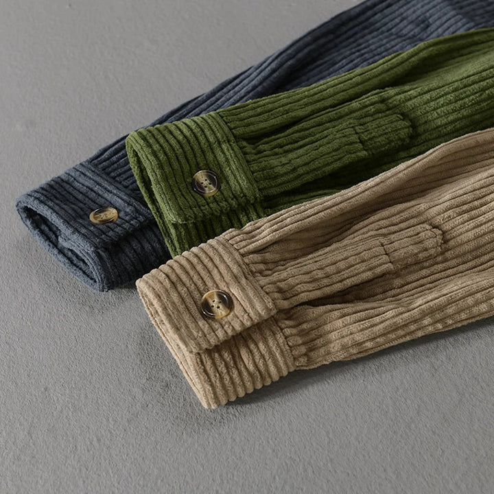 Folded cuffs of Julian corduroy shirt in three colors, dark blue, olive green, and khaki