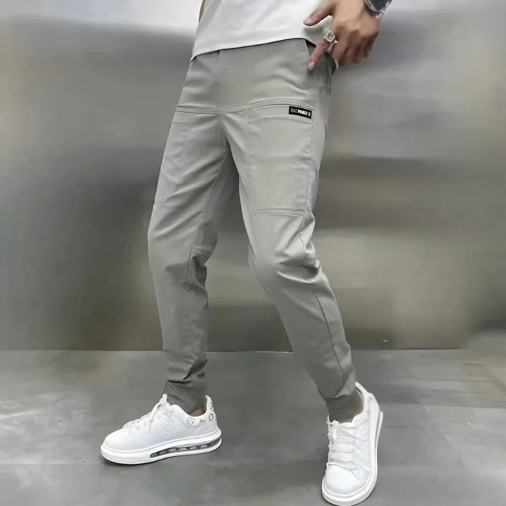 Julian elastic waist tapered cargo joggers, side view walking pose