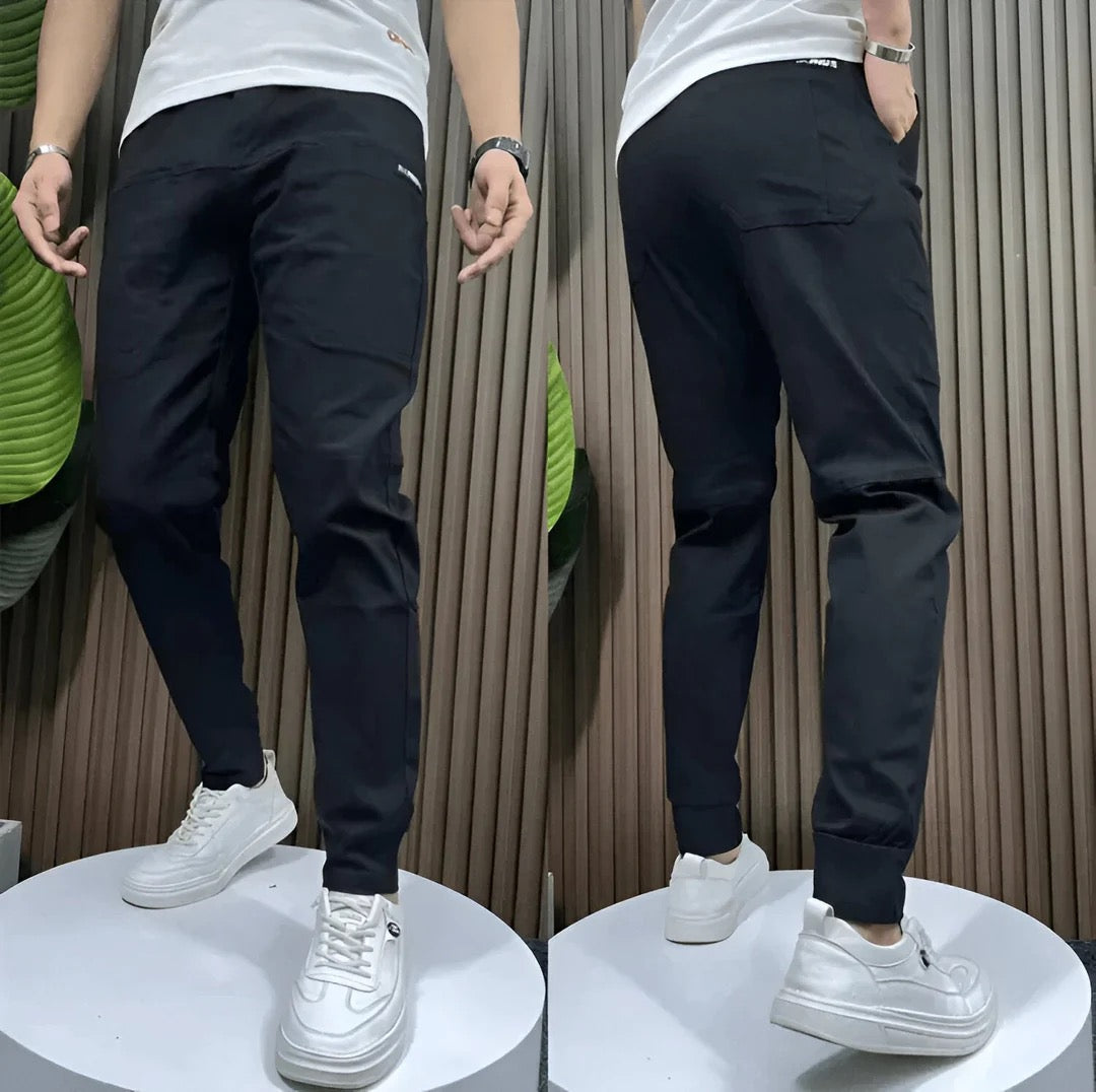 Julian black cargo joggers, front and back view on stand