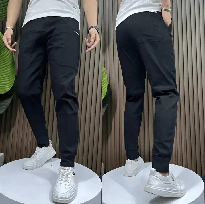 Julian black cargo joggers, front and back view on stand