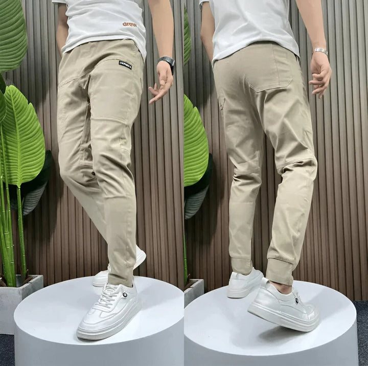 Julian beige cargo joggers, front and back view on stand
