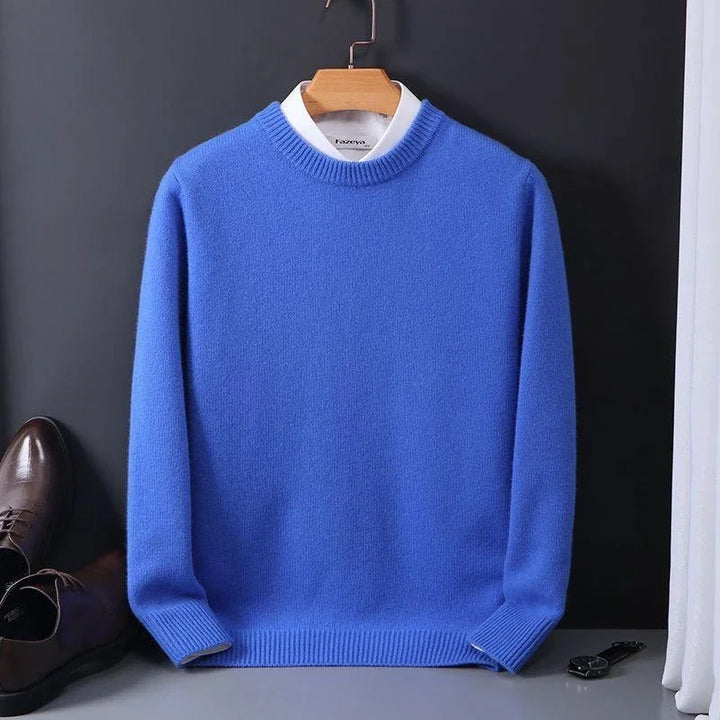 Julian blue mock neck cashmere sweater on hanger, styled with dress shoes