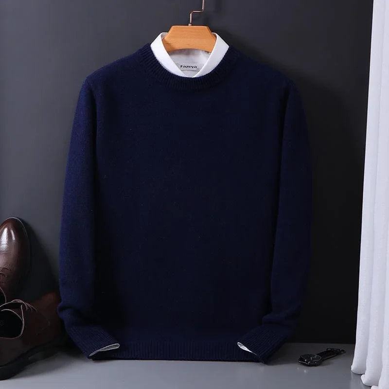 Julian navy mock neck cashmere sweater on hanger, styled with dress shoes