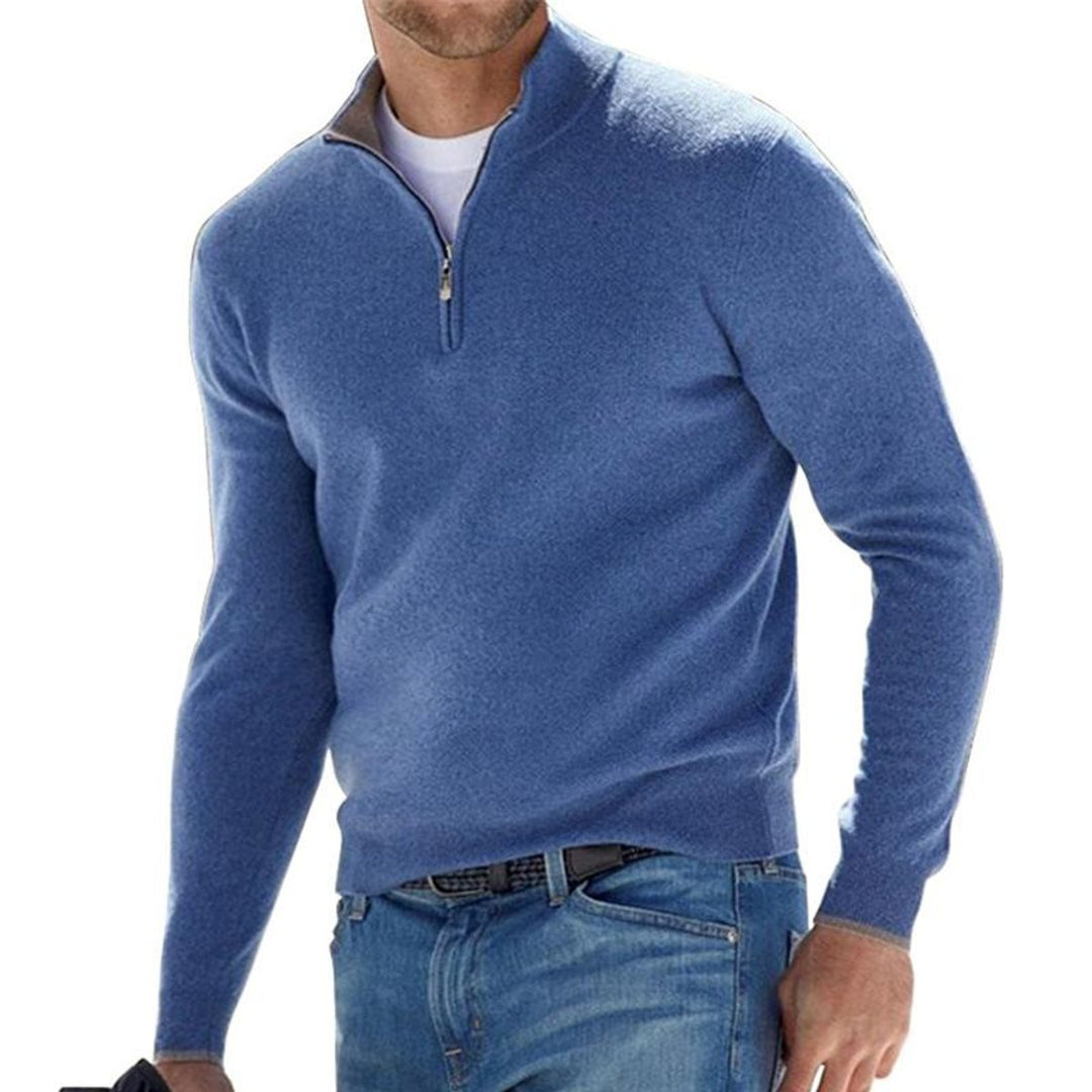 Julian quarter zip regular fit sweater in blue, front view worn with jeans