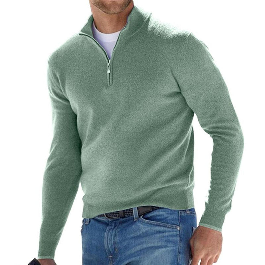 Julian quarter zip regular fit sweater in green, front view worn with jeans