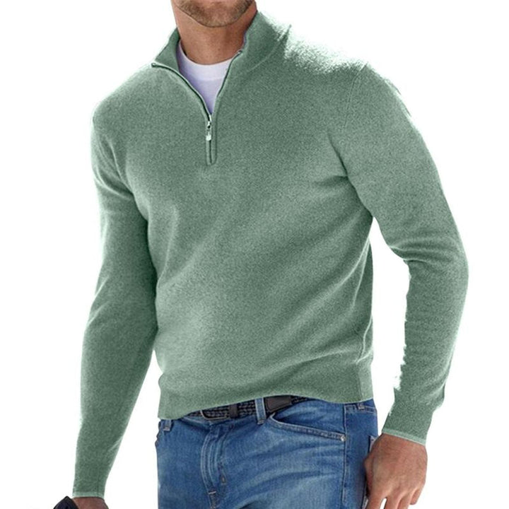 Julian quarter zip regular fit sweater in green, front view worn with jeans