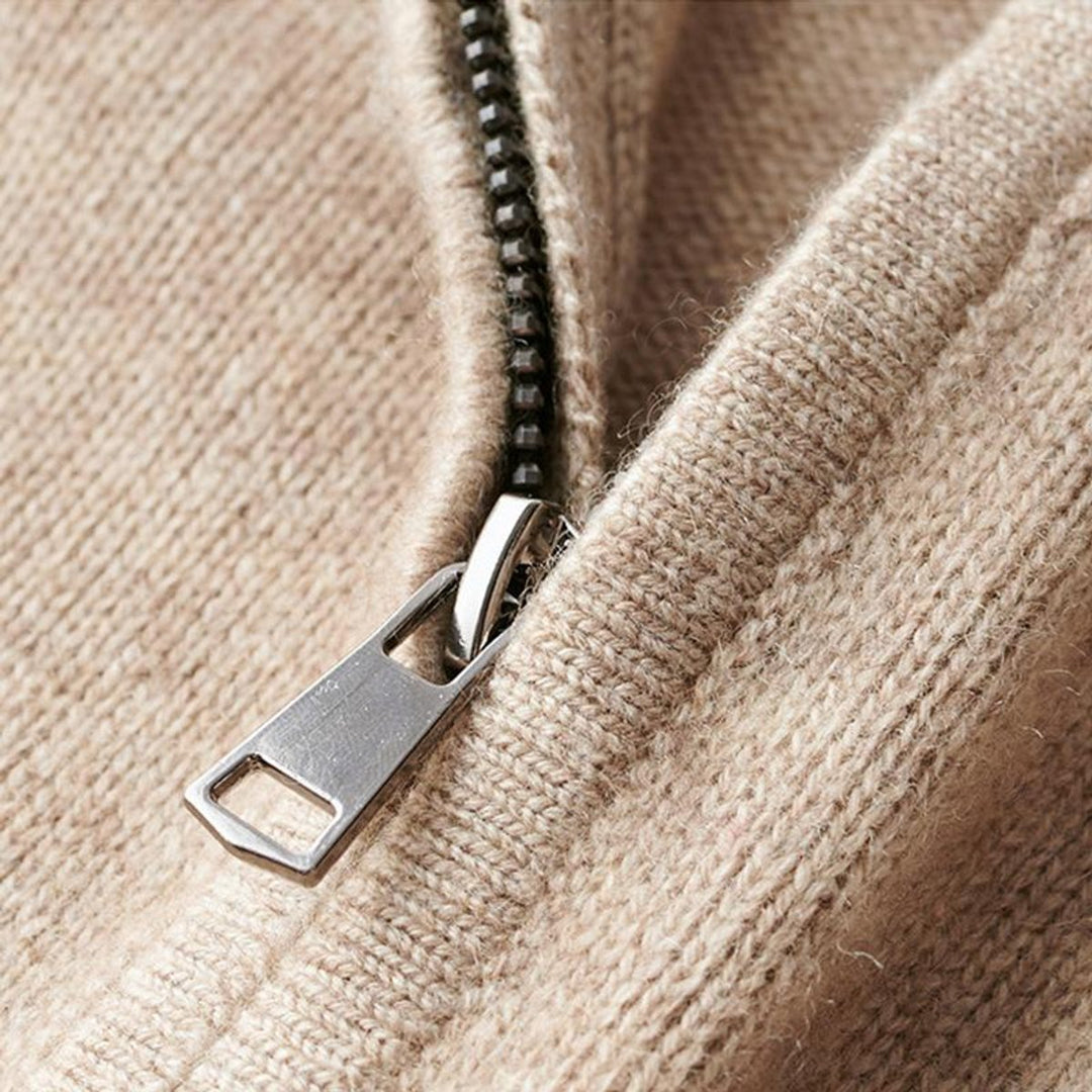 Close-up of the quarter zip pull and ribbed knit collar on Julian sweater