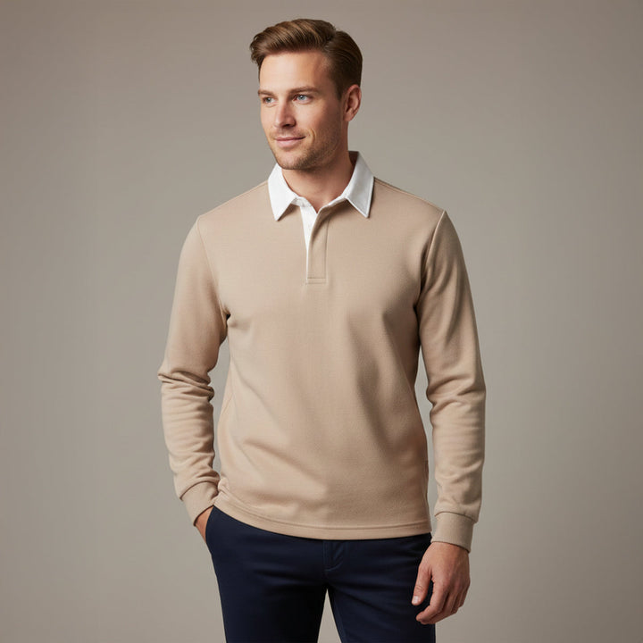 Lachlan khaki long sleeve polo worn by model with navy pants
