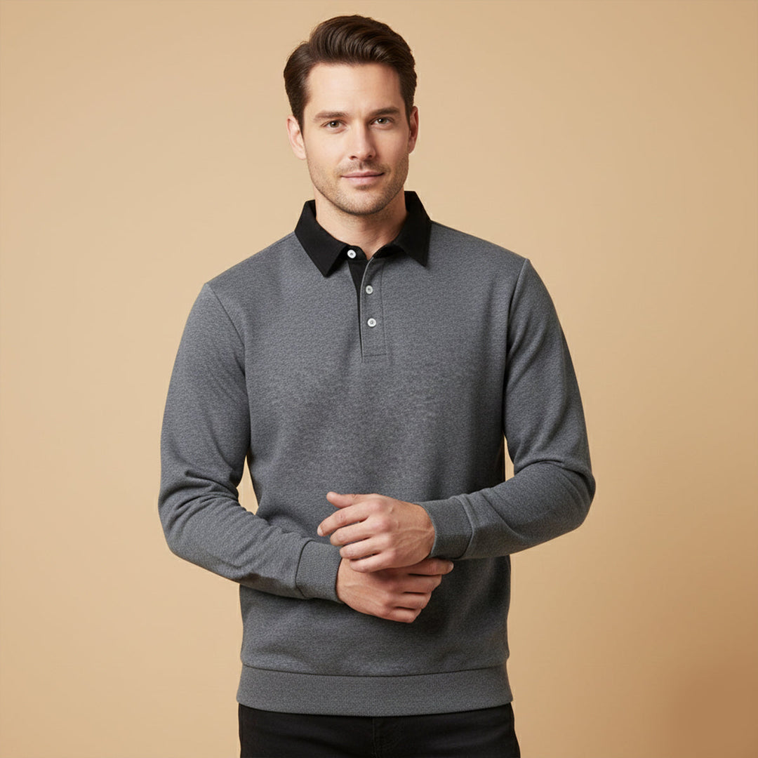 Lachlan dark gray polo worn by model with black pants