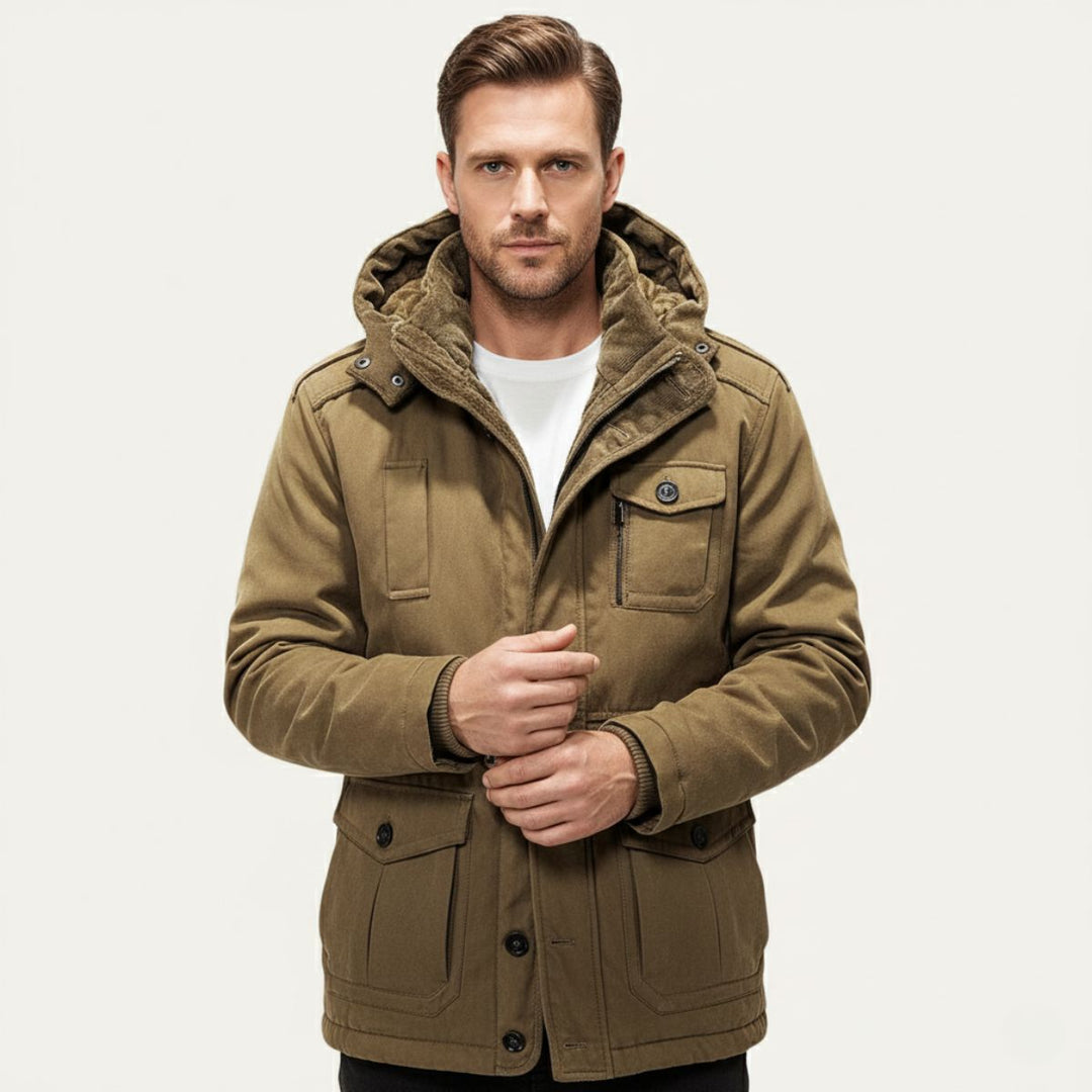 Man wearing Landon khaki hooded parka with front pockets buttoned up