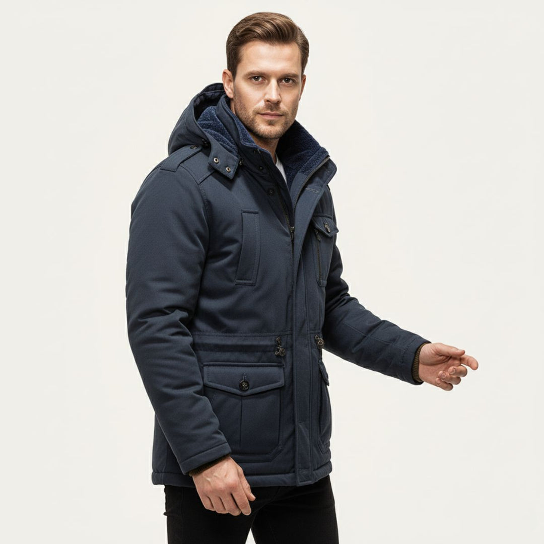 Man wearing Landon navy blue parka jacket, side angle