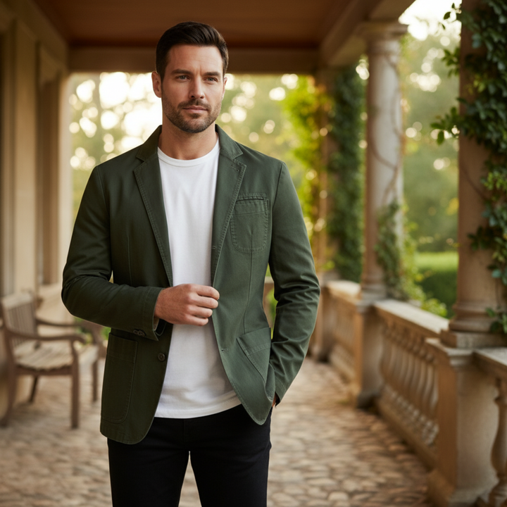 Model wearing Lawrence green blazer outdoors on a covered patio