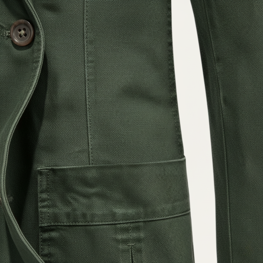 Close-up of Lawrence blazer side pocket and sleeve seam detail