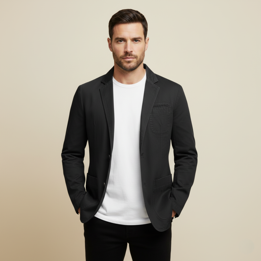 Model wearing Lawrence black casual blazer with white t-shirt and black pants