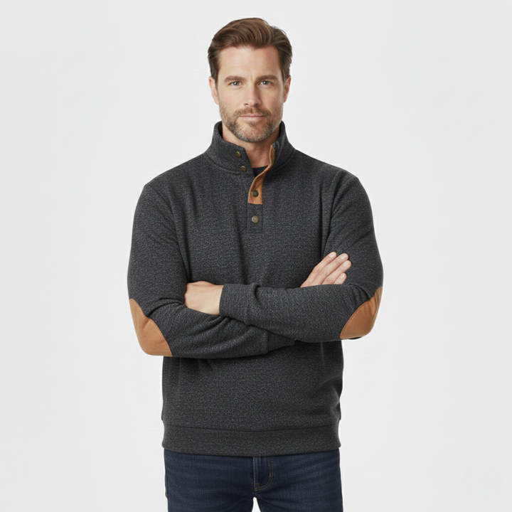 Model wearing Marcellus black sweater, arms crossed