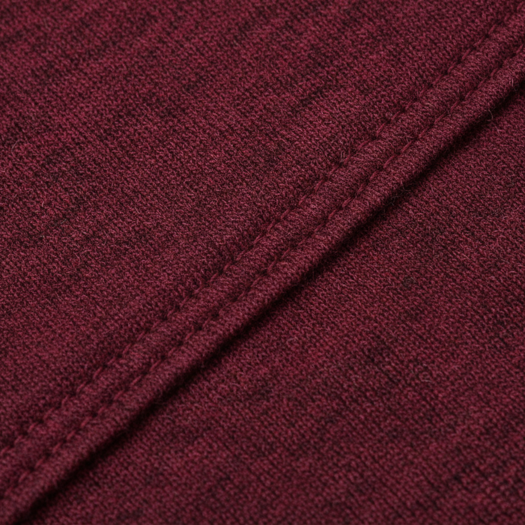 Close-up of Marcellus burgundy knit fabric texture and stitching