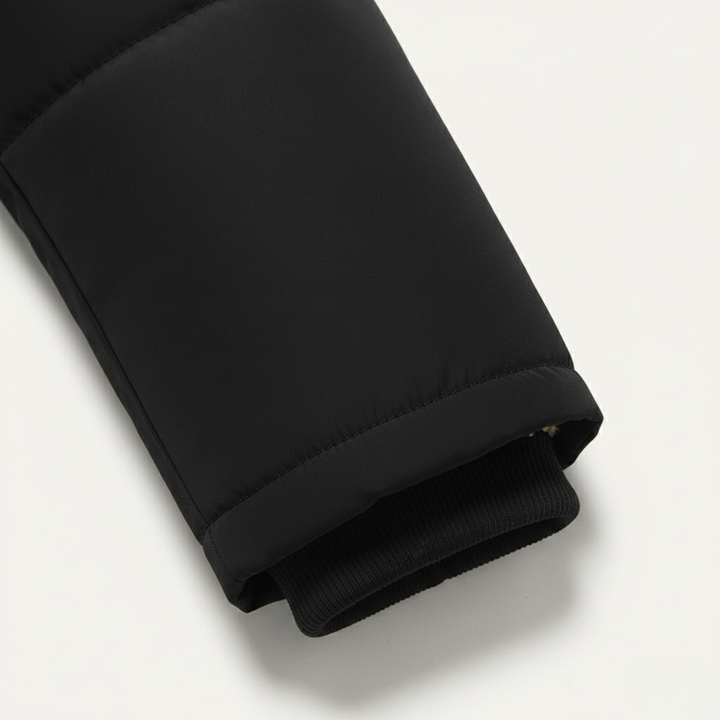 Close-up of ribbed cuff detail on Marcus hooded parka sleeve